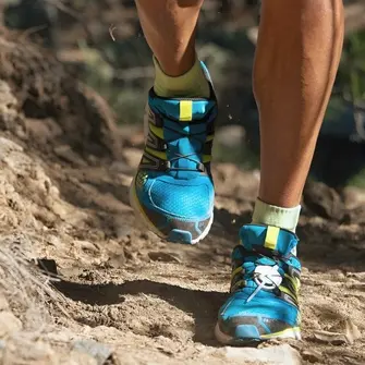 Runner advancing one step at a time along a scenic path
